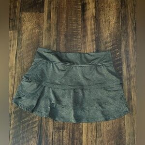 Selling mini skirt that's barely used dark greyish black and its a bit more mini